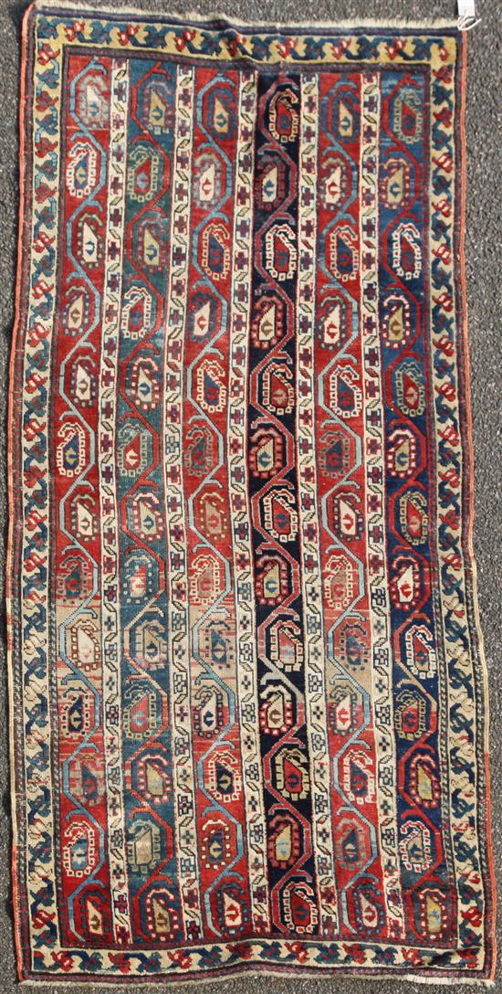 A Kazak multi coloured runner, c.1900, 7ft 5in by 3ft 5in.